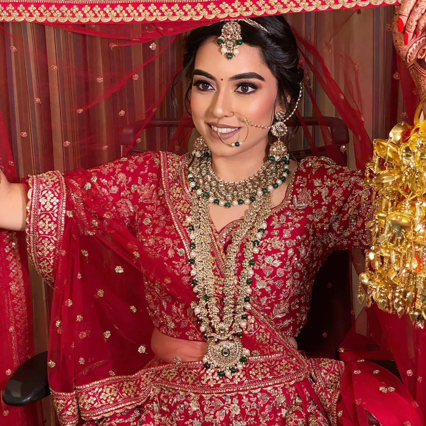 Red Net Dupatta, Layered Necklace. Bridal makeup by Madhu Gupta at MG Makeovers, Gurugram